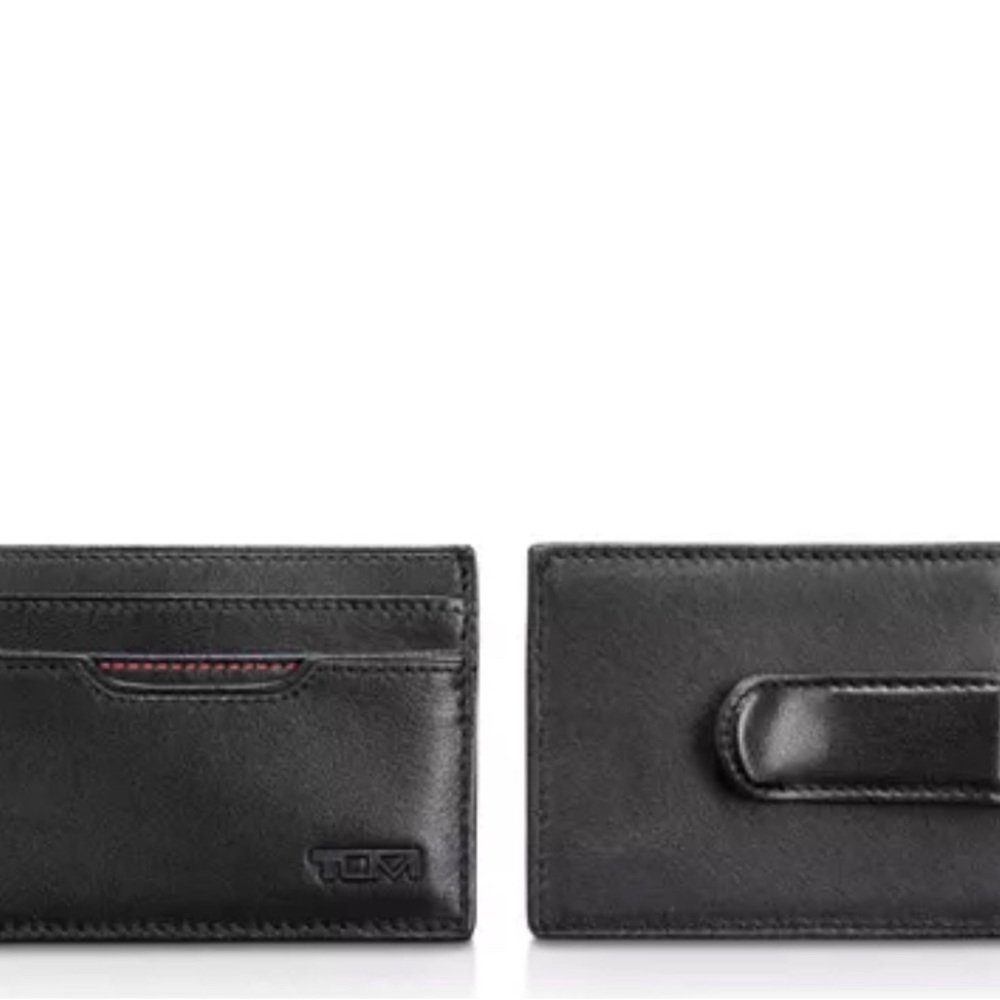 TUMI. NEW. Delta black leather clip credit card case